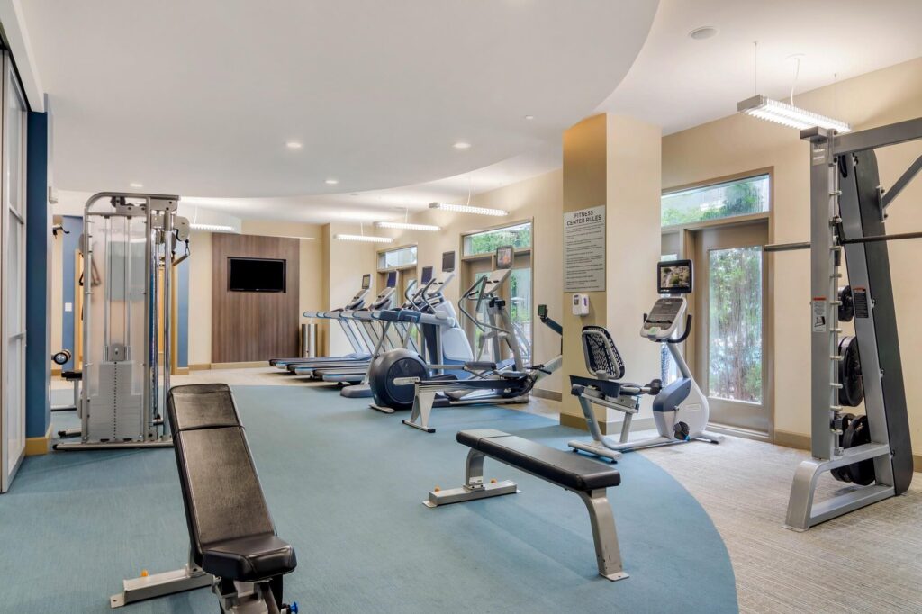 Fitness center with cardio and strength training equipment
